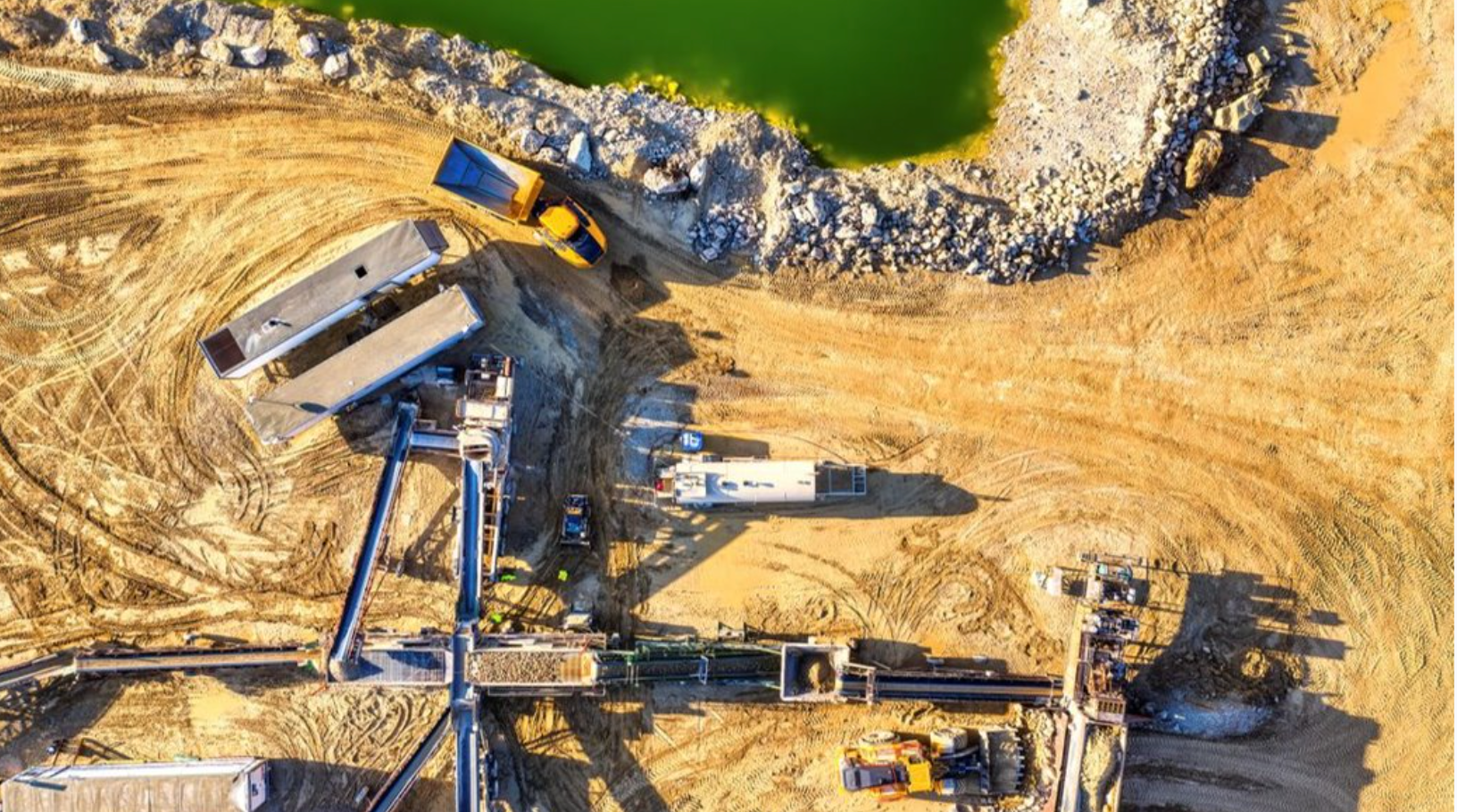 Aerial view of critical minerals mining operation — lithium and cobalt supply chain infrastructure